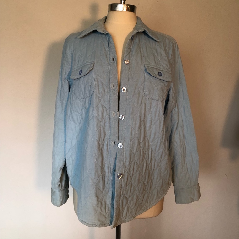 Women’s blue button-up quilted jacket